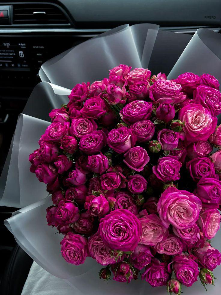 Professional floral arrangement in modern corporate setting